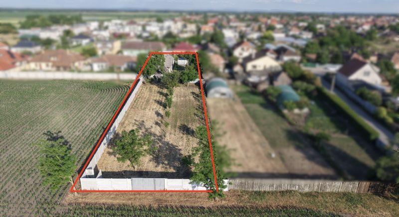 Aerial view of the property and family house in Nesvady with a rural setting.