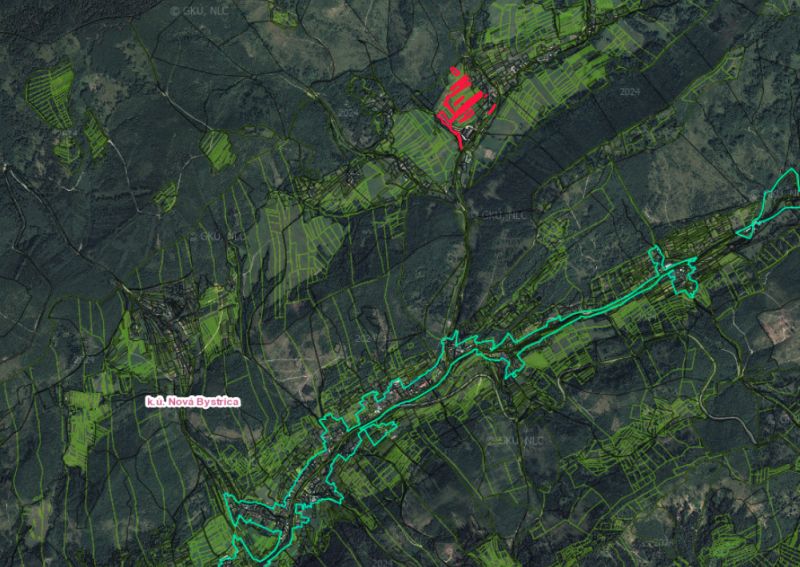 Agricultural and forest lands around Nová Bystrica, visible on the satellite image.