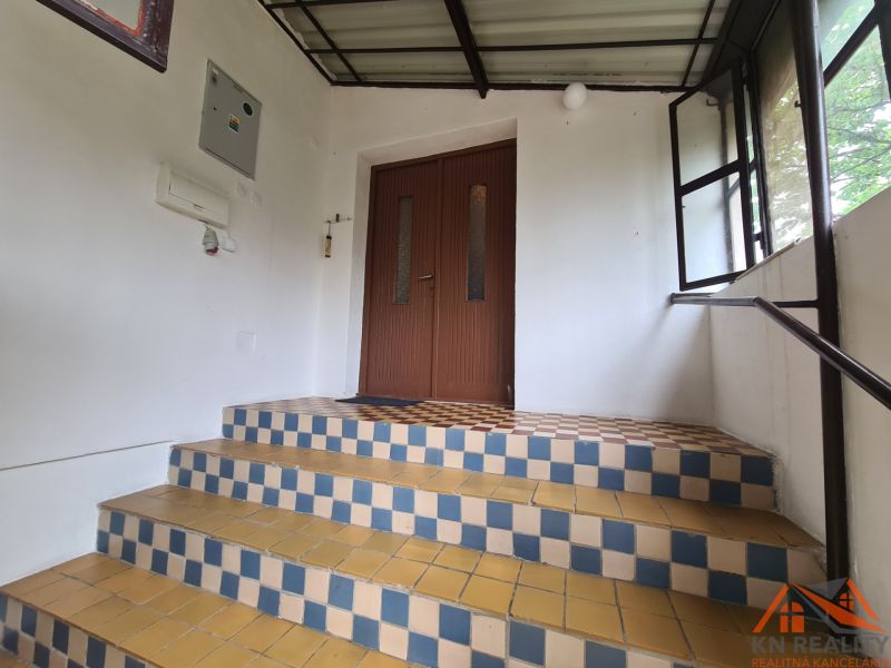 Entrance steps with colorful tiles in a family house in Dulovce.