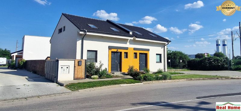 A family house on Hviezdoslavova Street in Senec with a colorful facade and a garden.
