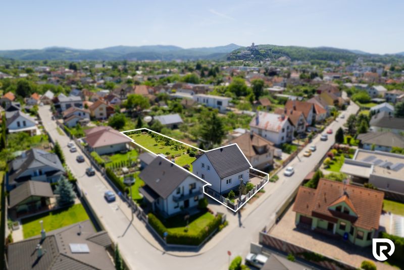 A family house on Jahodova Street in Trenčín, surrounded by greenery and nearby houses.