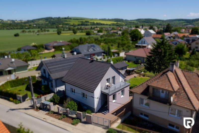 A family house on Jahodová Street in Trenčín with a terrace and a landscaped garden.