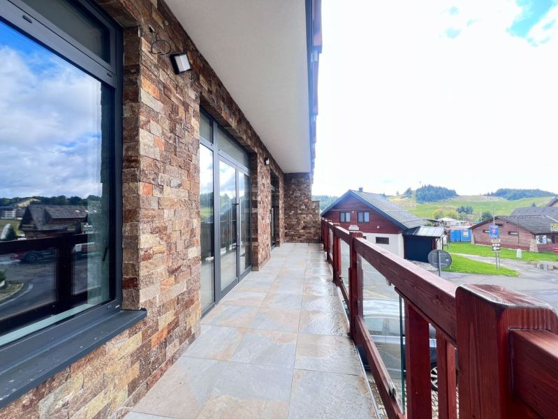 The balcony of commercial premises with a stone facade in Donovaly, Banská Bystrica district.
