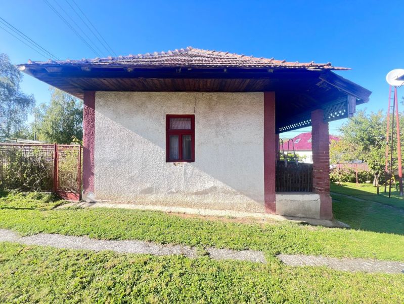 A family house in Žirany, Nitra district, Nitra region, Slovakia, surrounded by a green lawn.
