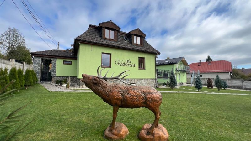The statue of a deer in front of the villa in the village of Štôla, Poprad District, Prešov Region, Slovakia.