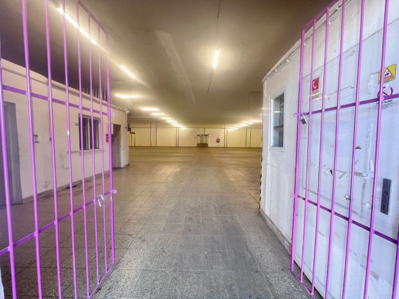 Space with grid and lighting, used for warehouses and halls.