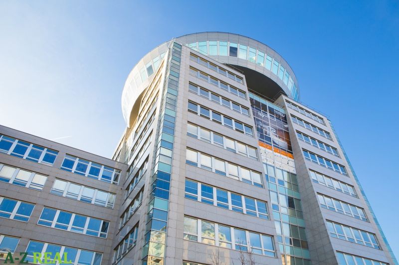 Office building on Plynárenská Street in Bratislava - Ružinov against the backdrop of a blue sky.