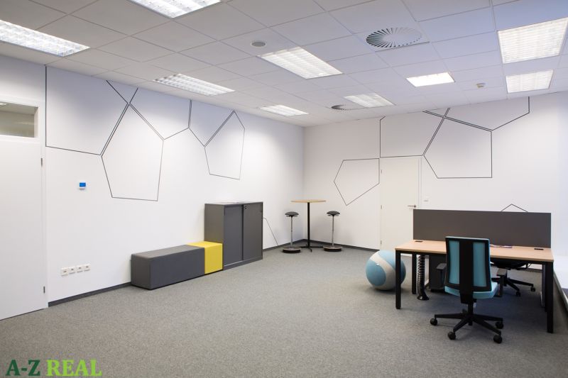 Offices with chairs, tables, and decorated walls, floor with wooden decor.
