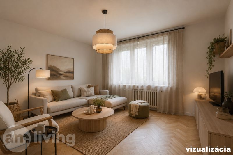Living room in a 3-room apartment with a sofa, wooden decor flooring, and decorations.
