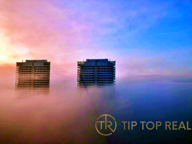 Skyscrapers in the morning mist offer a beautiful view on Továrenská Street, near the three-room apartment.