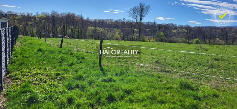 Green meadow and fence in the background of the forest, suitable for residential land in Lutila.