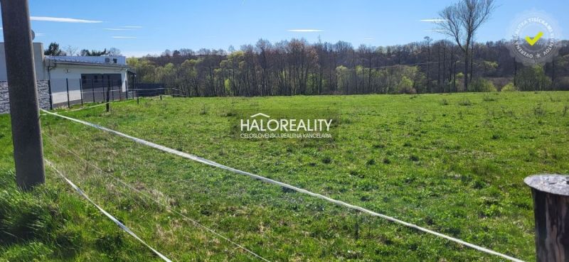 Land - housing in Lutila: extensive grassy areas surrounded by trees and fencing.