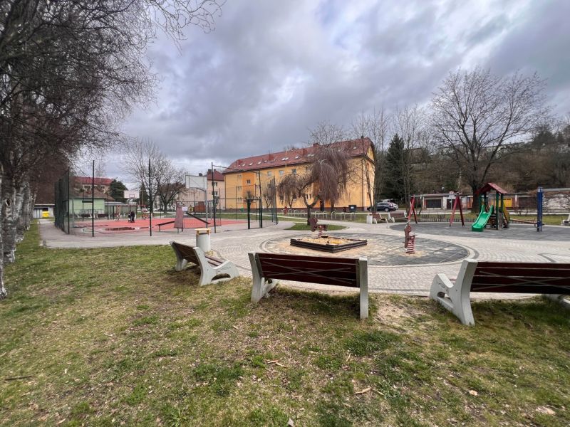 In Ružomberok, there is a children's playground with swings, benches, and a multifunctional sports field.
