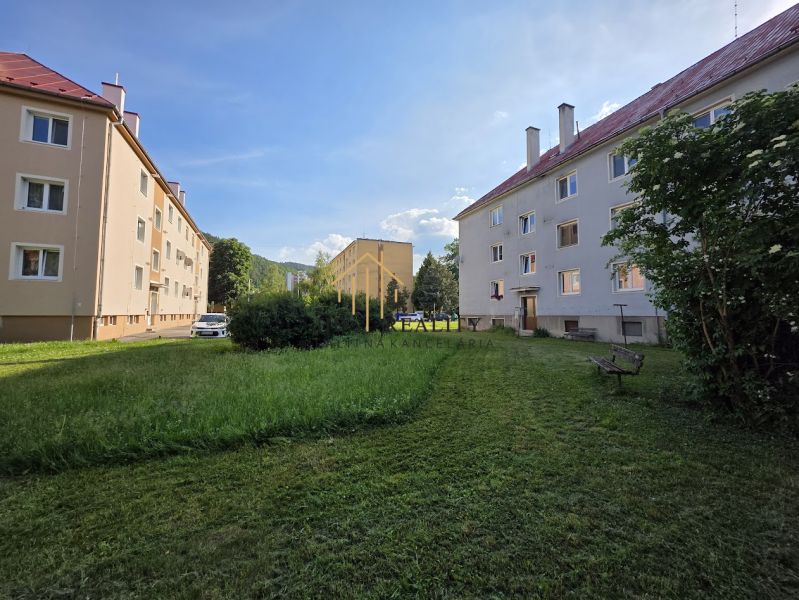 Buildings and park area on Golianova Street in Banská Bystrica, suitable for a 2-room apartment.