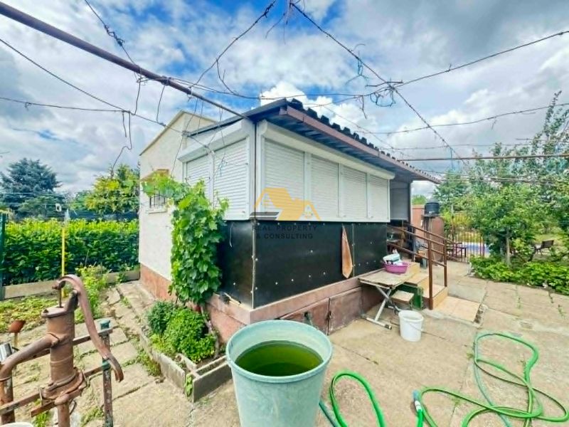 A cottage on the street in Nové Zámky with a courtyard and garden, outdoor equipment.
