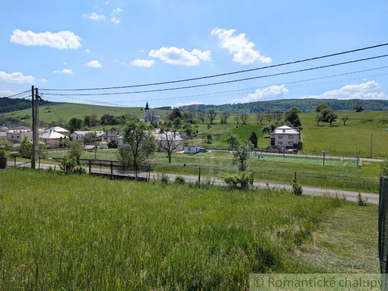 Landscape in Karnej with a view of the church, houses, and greenery, Land - housing.