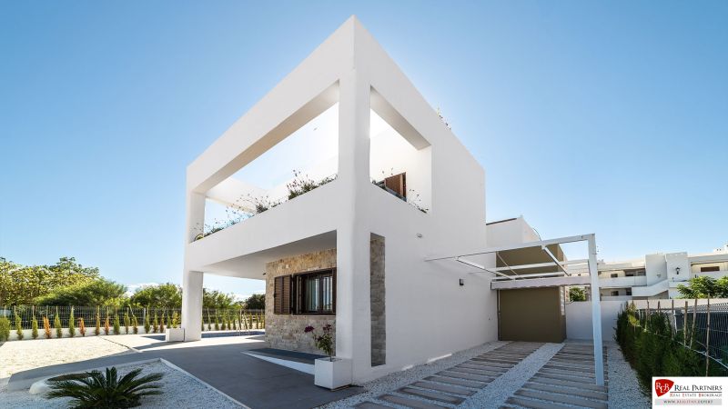 Two-story 2-bedroom apartment in Pulpí with minimalist design and a garden.