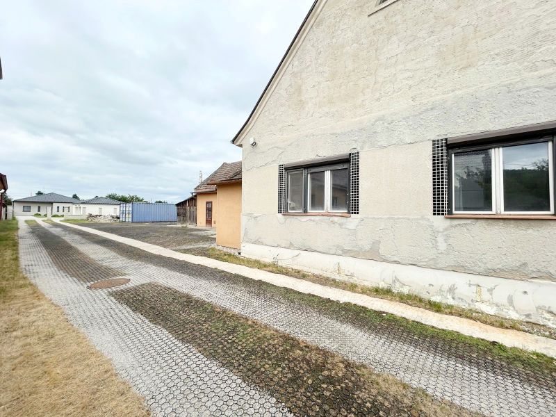 Family house on Krajinská Street in Podunajské Biskupice, Bratislava, with an access road.
