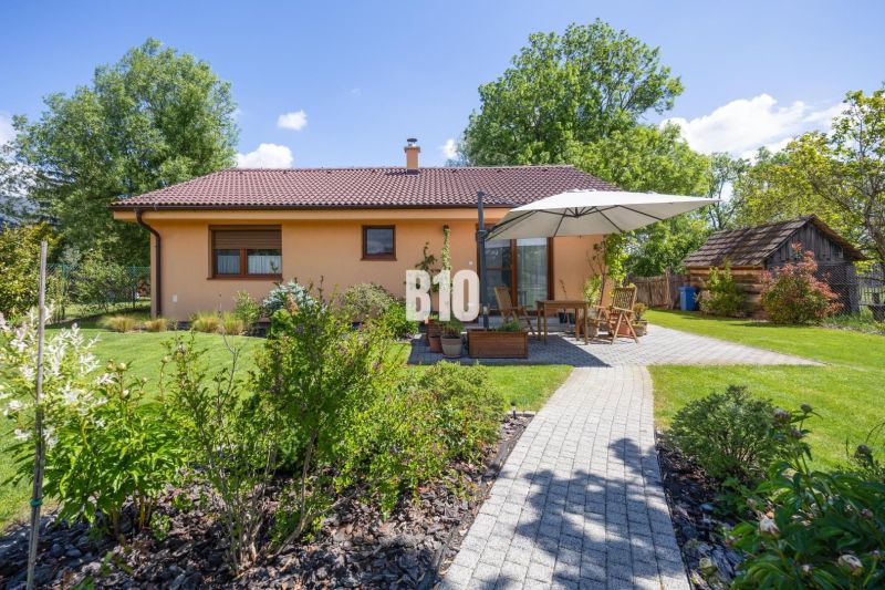 A family house in Bíkové Humence with a terrace, garden, and pleasant greenery.