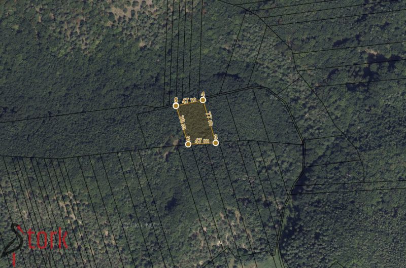 Aerial view of agricultural and forest lands in the Rajecká Lesná area, parcel division.