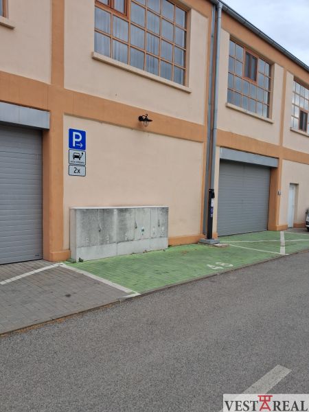 Parking spaces at warehouses and halls on Coburgova Street in Trnava.