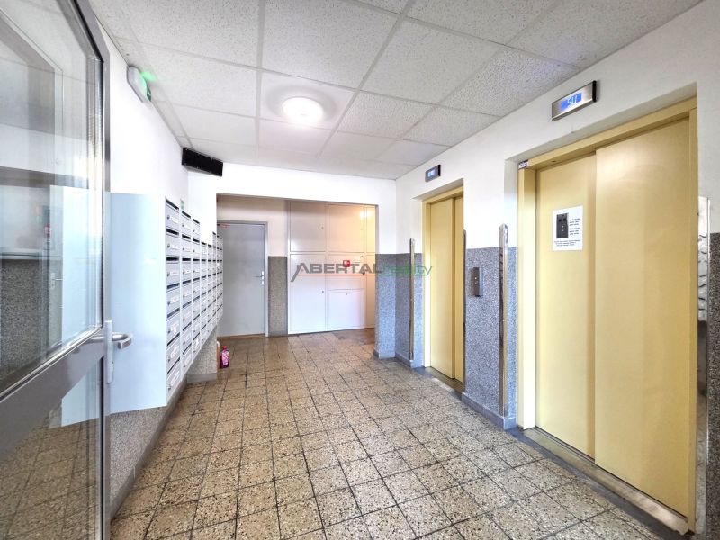 The entrance hall with mailboxes and elevators on Ipeľská Street in Podunajské Biskupice.