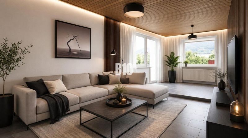 A stylish living room in a family house with a comfortable sofa and a view of nature.