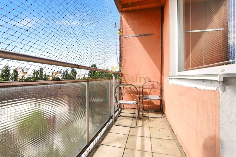 A balcony in a 2-room apartment on Rovníková Street in Bratislava - Ružinov with simple furniture.