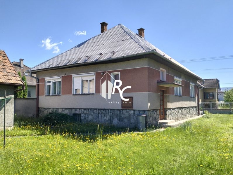 A family house on Štúrova Street in Sučany with a lawn and a metal roof.