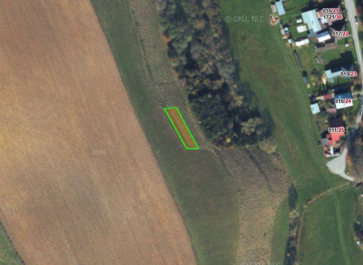 Aerial view of agricultural and forest land near Čierny Balog, with a marked plot.