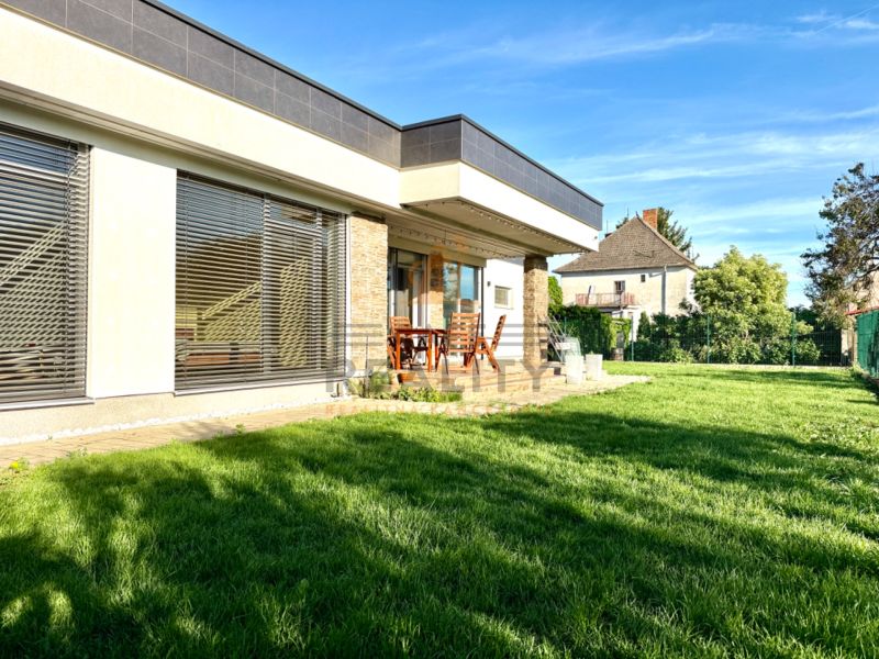 A family house on Lipová Street in Pata with a garden and seating on the terrace.
