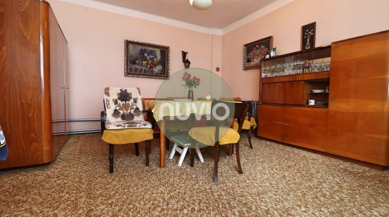 Living room in a family house with retro furniture and decorations.