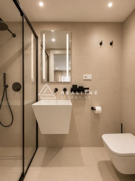 Bathroom with a shower, mirror, and wall-mounted sink in a 4-room apartment.