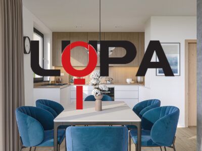 A dining room of a family house with a wooden decor floor and blue chairs.