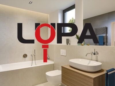 A bathroom in a family house with a freestanding bathtub and a sink on a wooden stand.