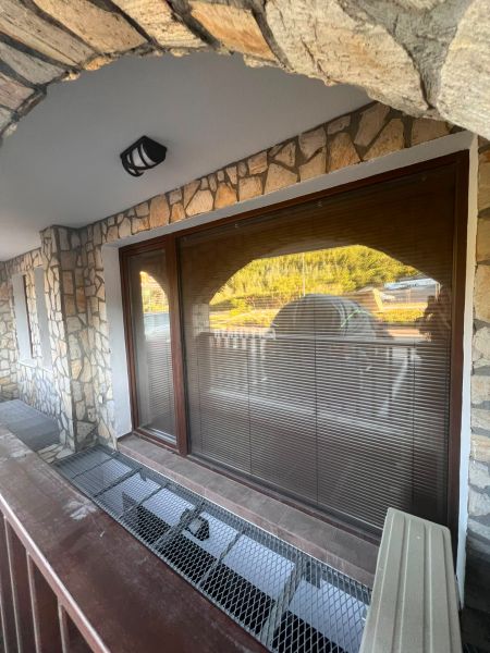 Stone facade and terrace with a view at a 2-room apartment in Sveti Vlas.