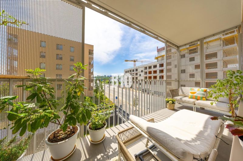 The balcony of a 3-room apartment on Jána Langoša Street in Bratislava IV with a view and plants.