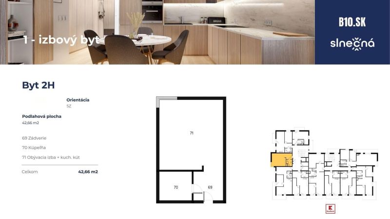 Interior of a 1-room apartment with a dining table and kitchen, floor with wooden decor.