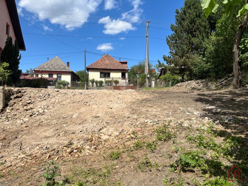 Residential plots in Rákoš with a view of family houses and greenery.
