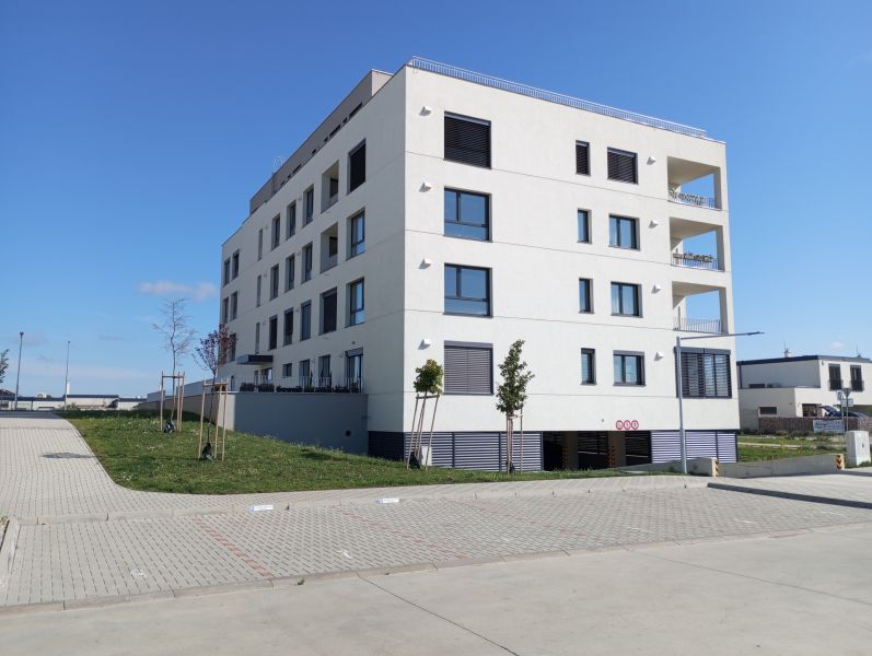 Apartment building on Tulipánová Street in Sereď with four floors and a parking lot.