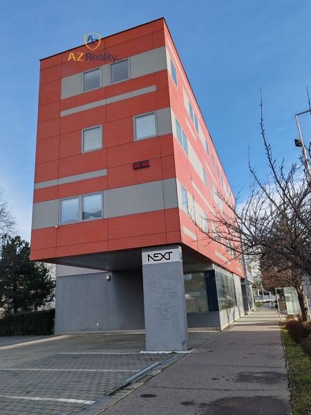 Administrative building with light stripes located on Záhradnícka Street in Komárno. Offices.
