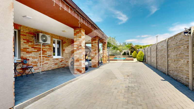 Family house in Lehota on Lehota Street, terrace with adjacent garden and swimming pool.