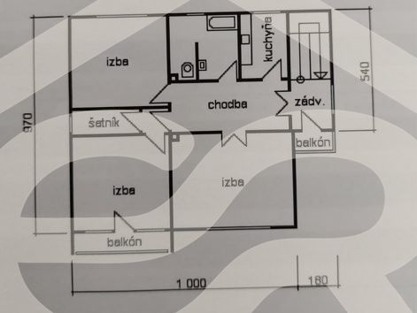 Floor plan of a family house with three rooms, a kitchen, two balconies, and a wardrobe.