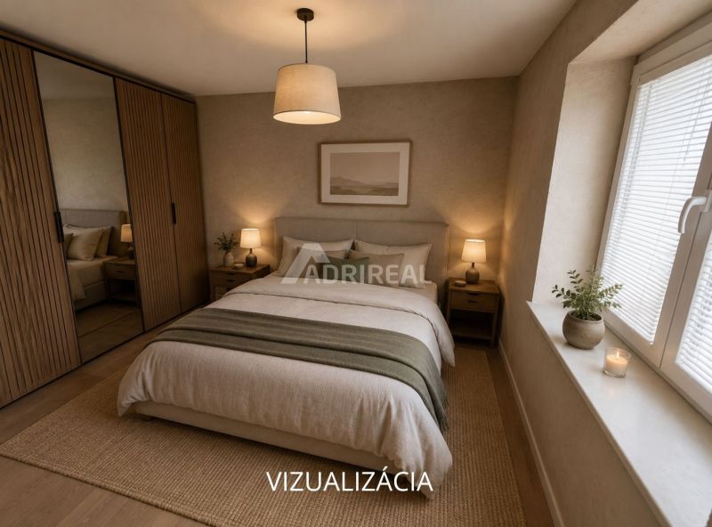 A bedroom in a family house with a bed, wardrobe, lamps, and a wooden-decor floor.