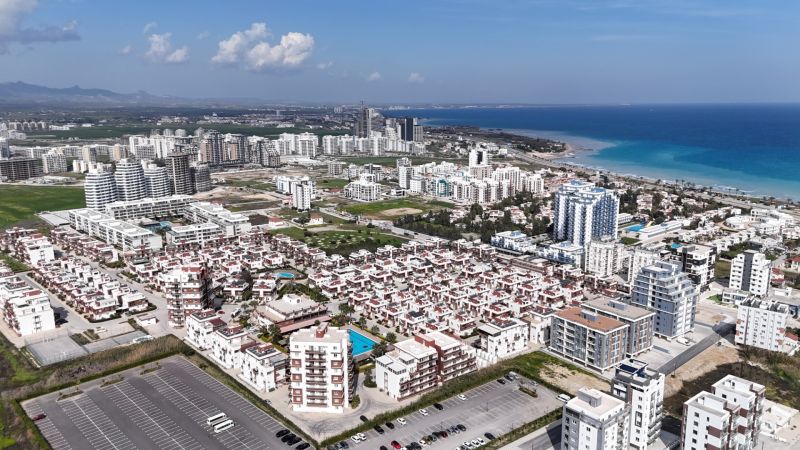 A view of coastal buildings and urban development in Agia Eirini.