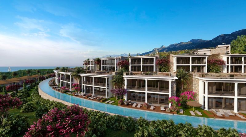 A holiday apartment in Agia Eirini with a sea view, surrounded by greenery and palm trees.