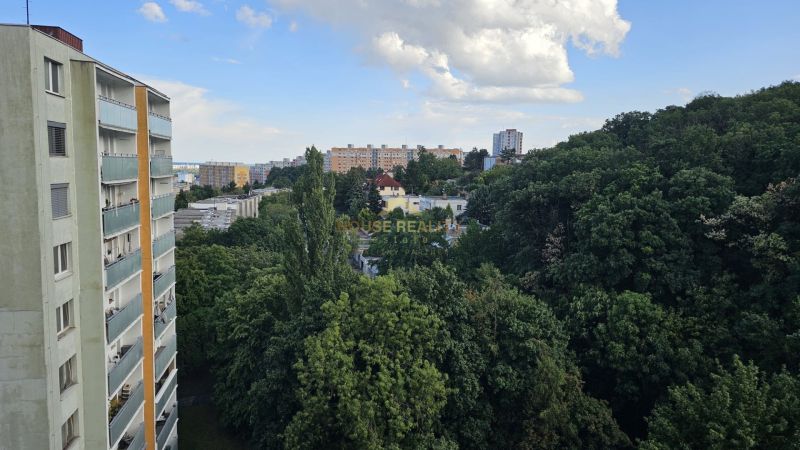 View from Kuklovská Street in Bratislava - Karlova Ves, surrounded by greenery.