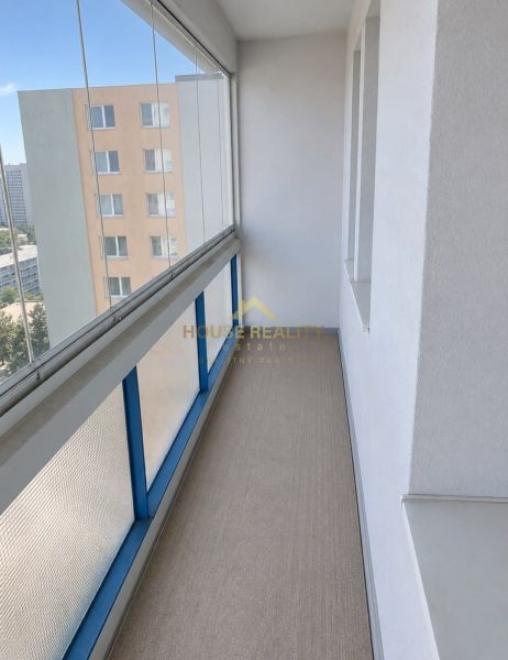 A glazed balcony of a 3-room apartment with a view of the surroundings in Bratislava - Karlova Ves.