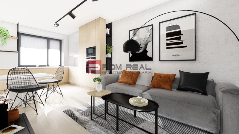 Living room in a two-room apartment with a wooden decor floor, neutral design.
