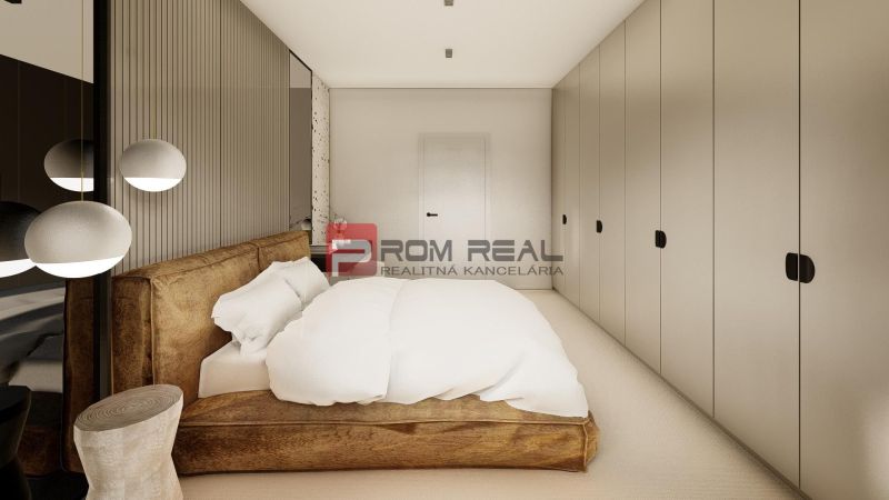A bedroom in a 3-room apartment with a comfortable bed and a wardrobe.